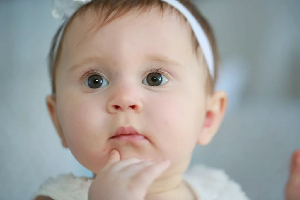 Close-up portrait of a baby girl during a professional children’s photography session